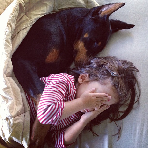 Girl And Doberman Do Everything Together From Sleeping To Bathing