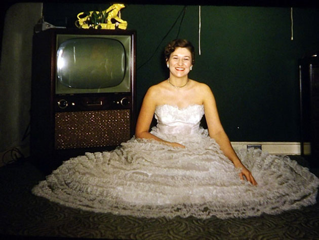 People-Standing-Next-to-Their-Televisions