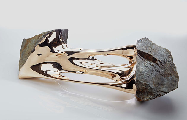 Bisected Boulders With Stretched Bronze Interiors by Romain Langlois