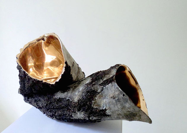 Bisected Boulders With Stretched Bronze Interiors by Romain Langlois