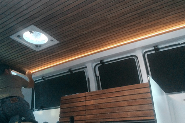 filmmaker-transforms-rusty-cargo-van-mobile-studio