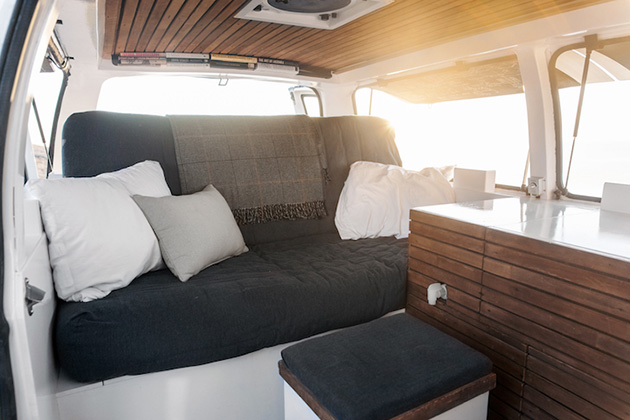 filmmaker-transforms-rusty-cargo-van-mobile-studio