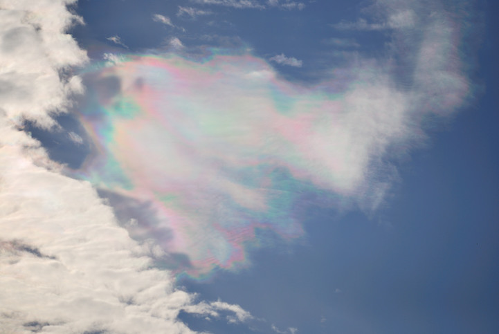 iridescent clouds colorful rainbows