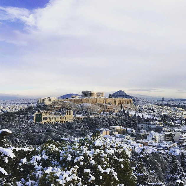 snow covered acropolis greece