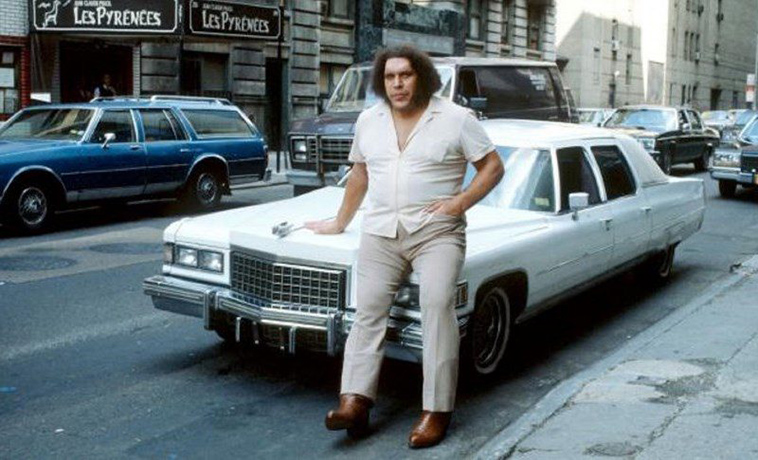 huge man and car