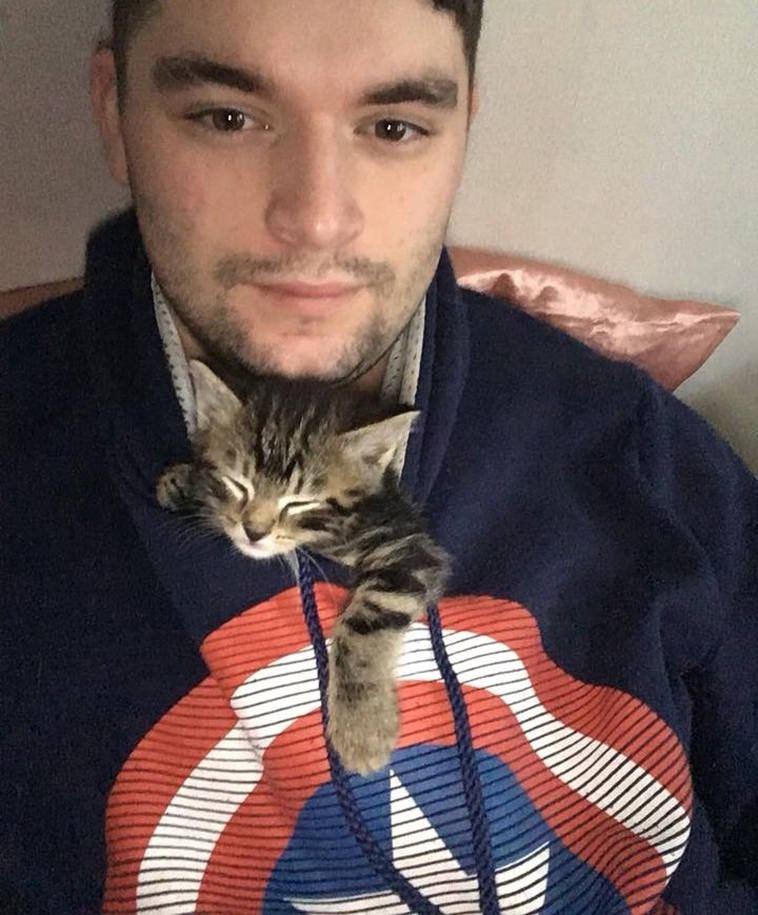 man gave kitten a home