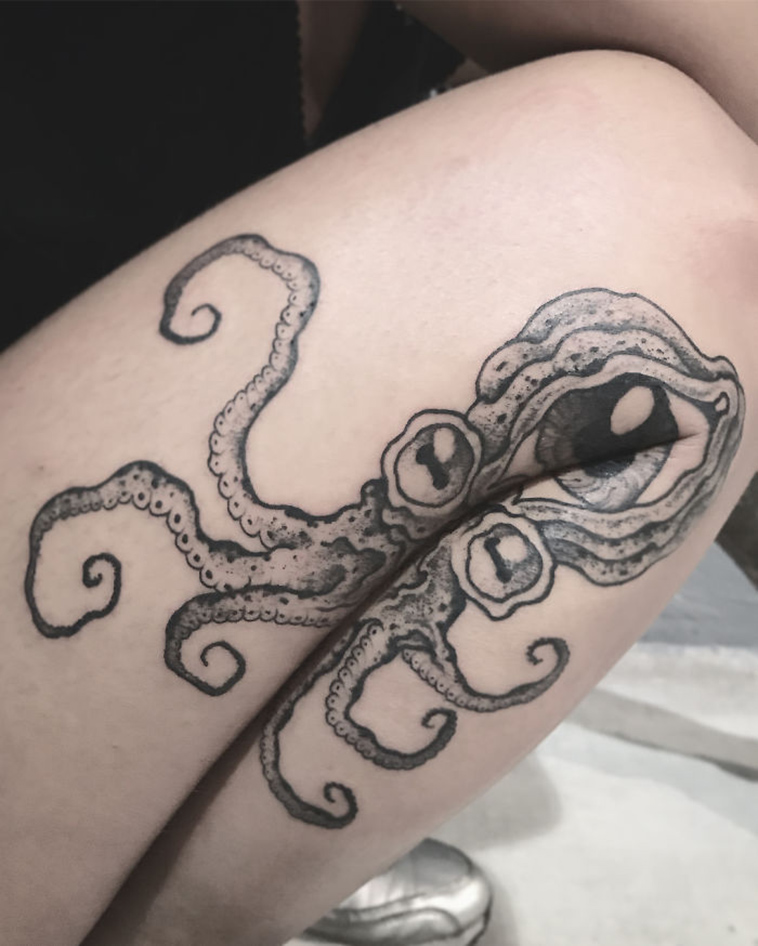 hidden-legs-arms-bending-insect-tattoo