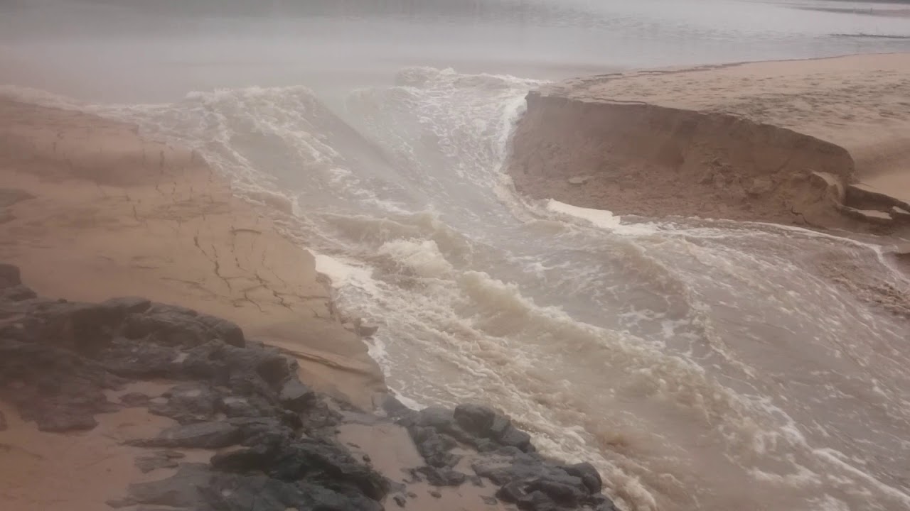 Guy Captures The Moment A River Cuts A New Channel To The Ocean