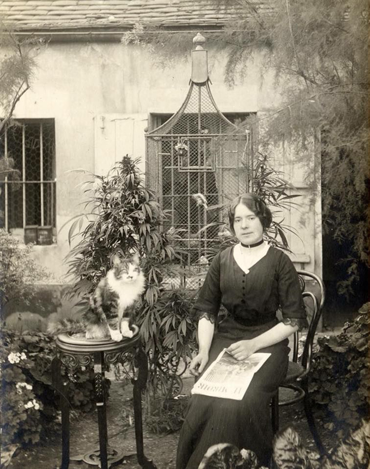 parisian woman with cat cannabis garden