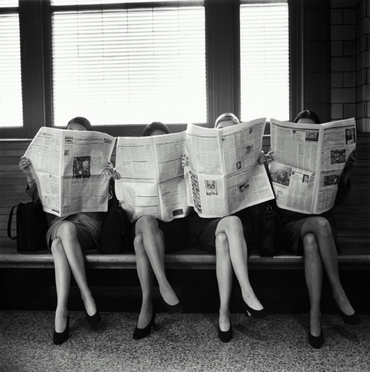 woman read newspapers