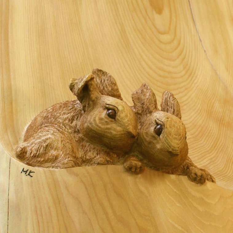 rabbits wood sculpture