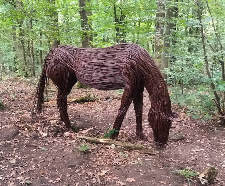 wood stick animal sculpture