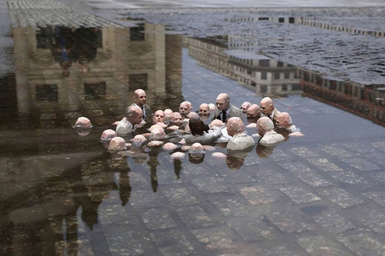 Isaac Cordal climate change statue