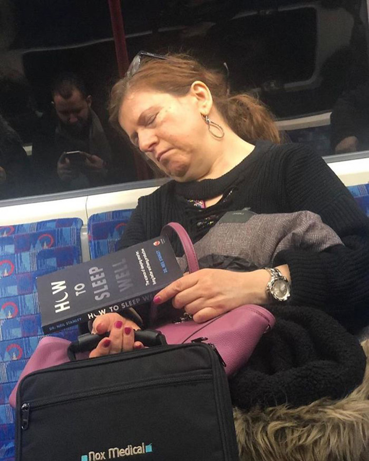 subway commute book reading