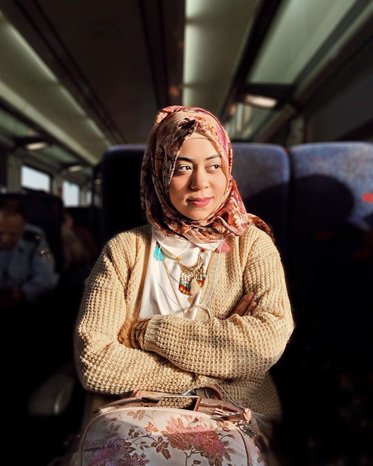 woman uses iphone photograph strangers