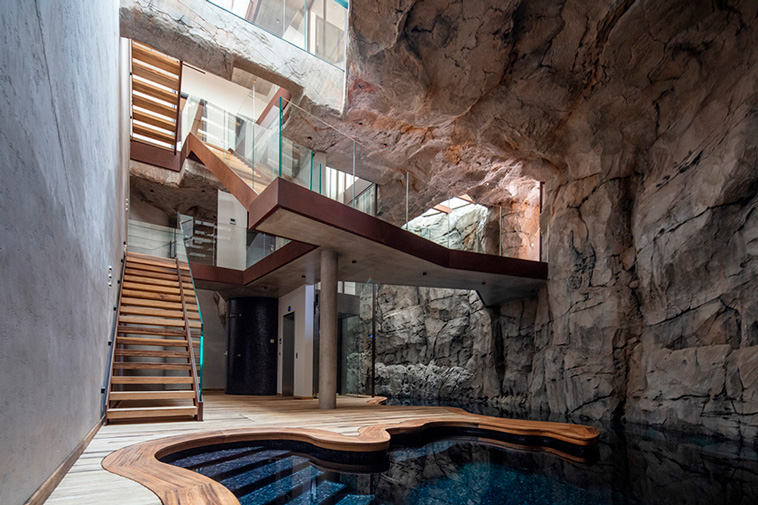 Modern Cave Villa Built Into A Massive Rock