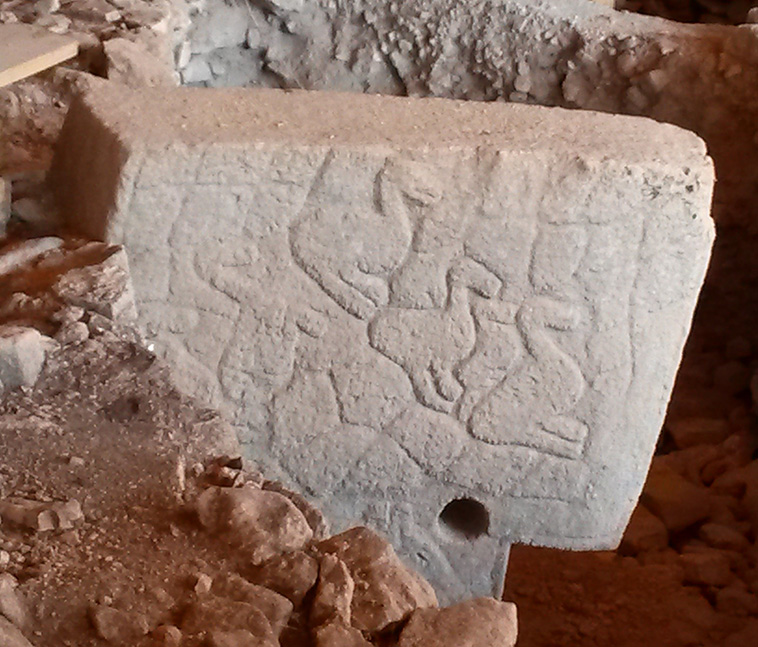 carvings on a pillar