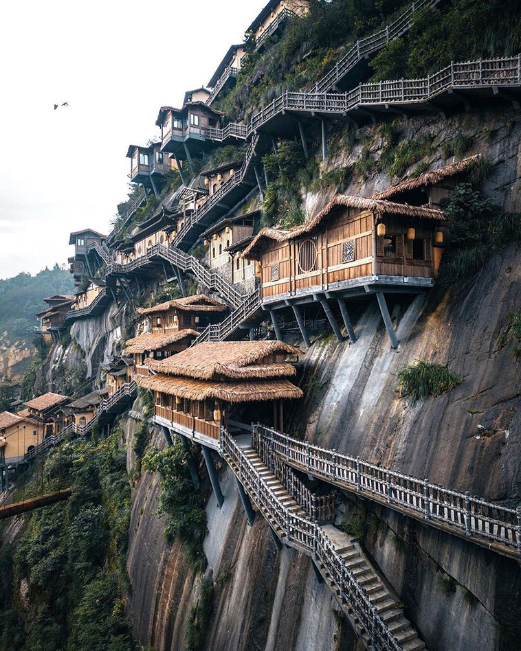 Wangxian Valley with Houses Hanging on Its Cliff