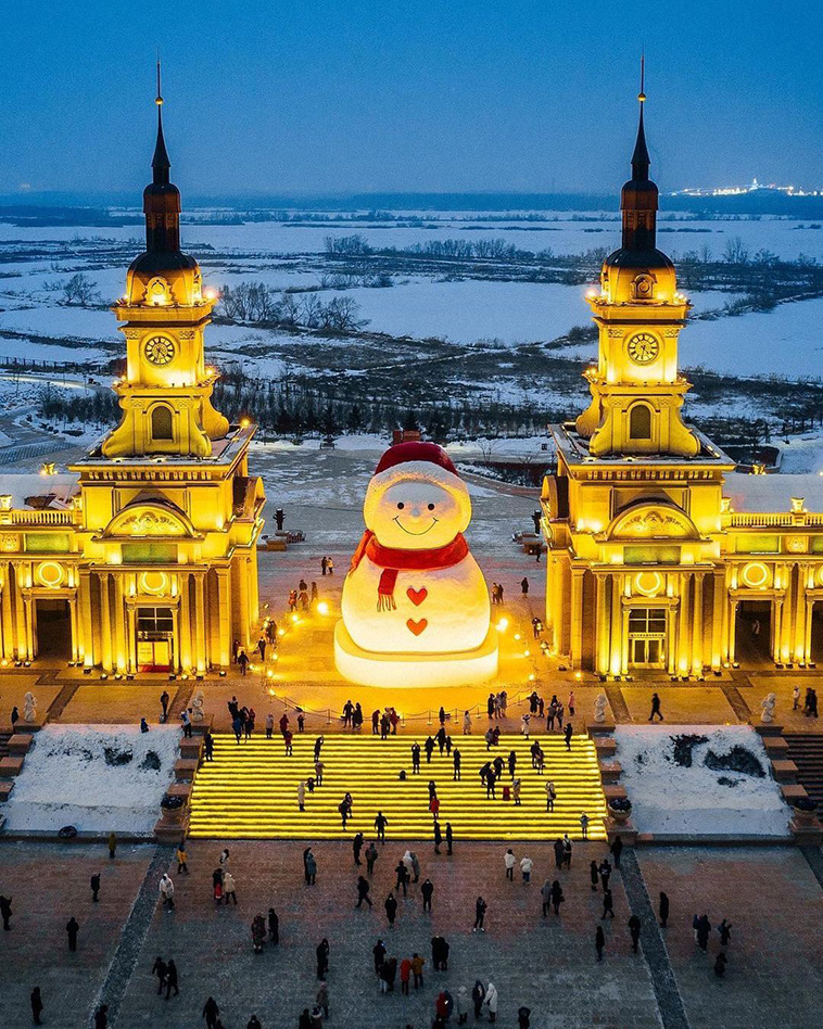 a snowman statue in Harbin Ice and Snow Festival 