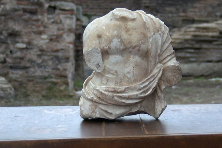 statue excavated from the secret roman tunnel