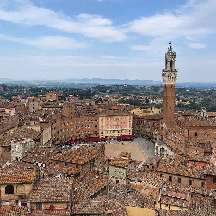 torre del mangia of siena's iconic buildings in the town square 