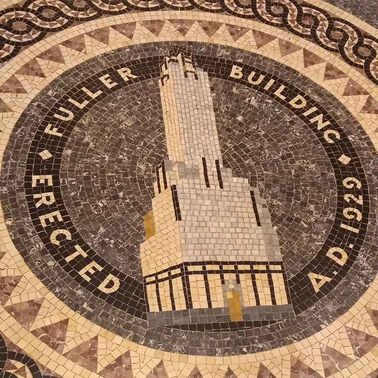 the mosaic at the entrance of the newer one of the two fuller buildings