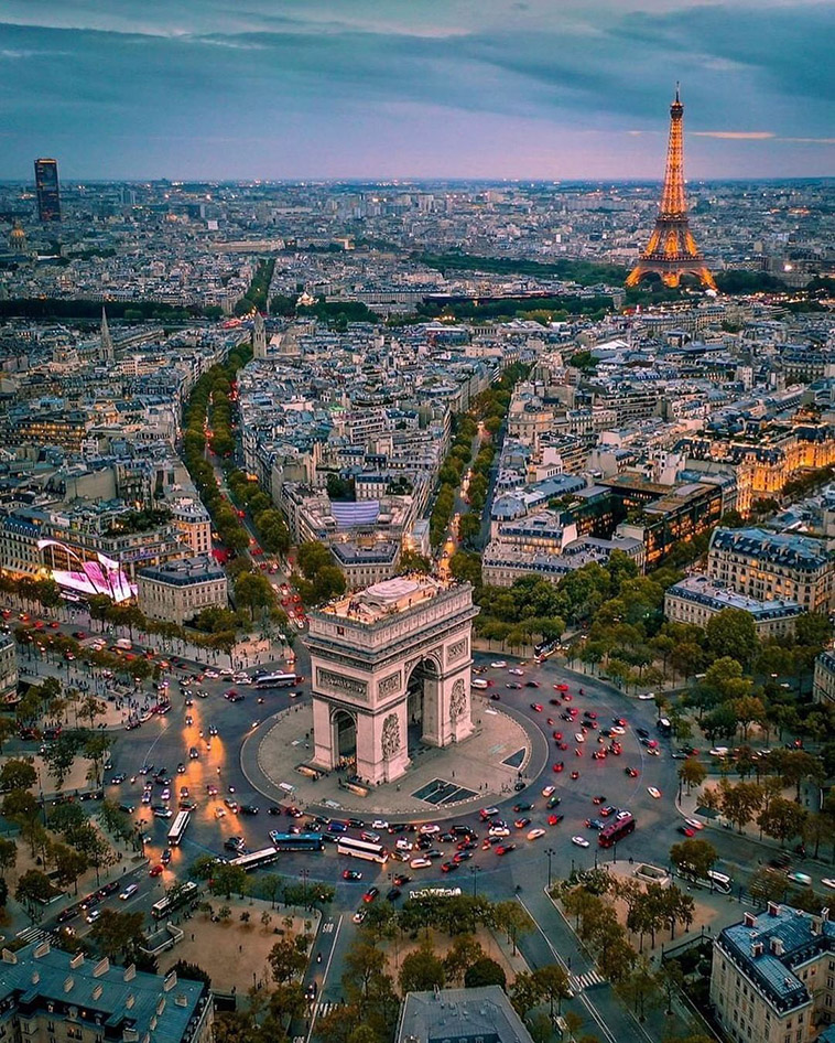 arc de triomphe in sunset in a photo of paris from above