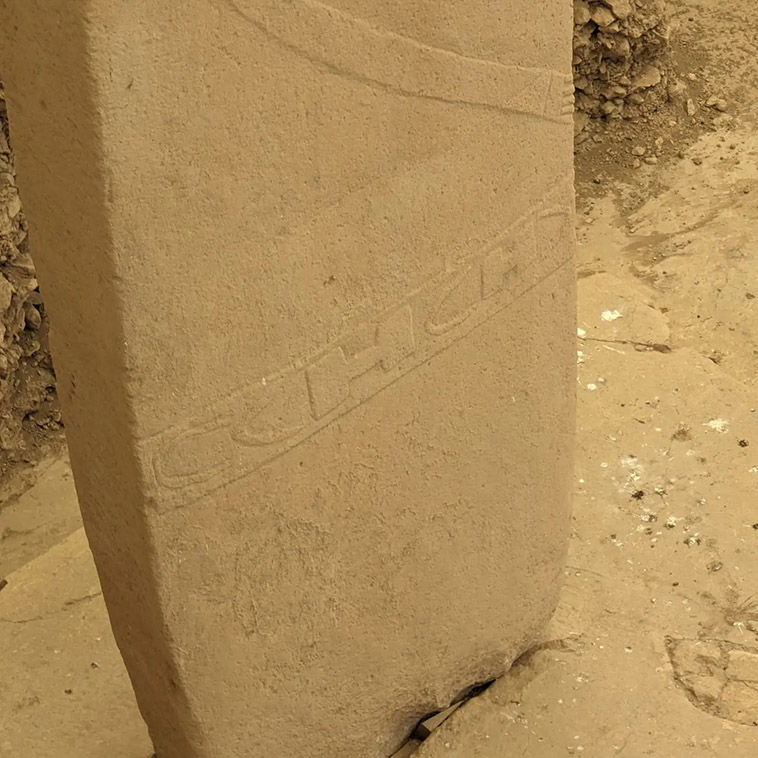 another carved stone with shapes